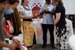 Sabine Baeyens qigong Master trainer giving a presentation to the Rotary club of Mbarara