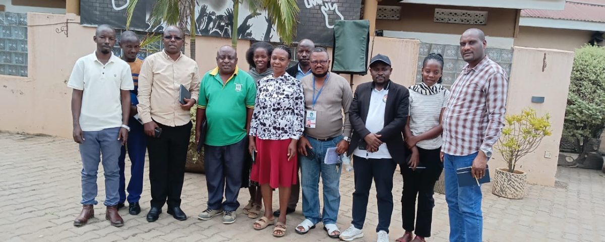 Project team with representatives from refugee communities in mbarara city